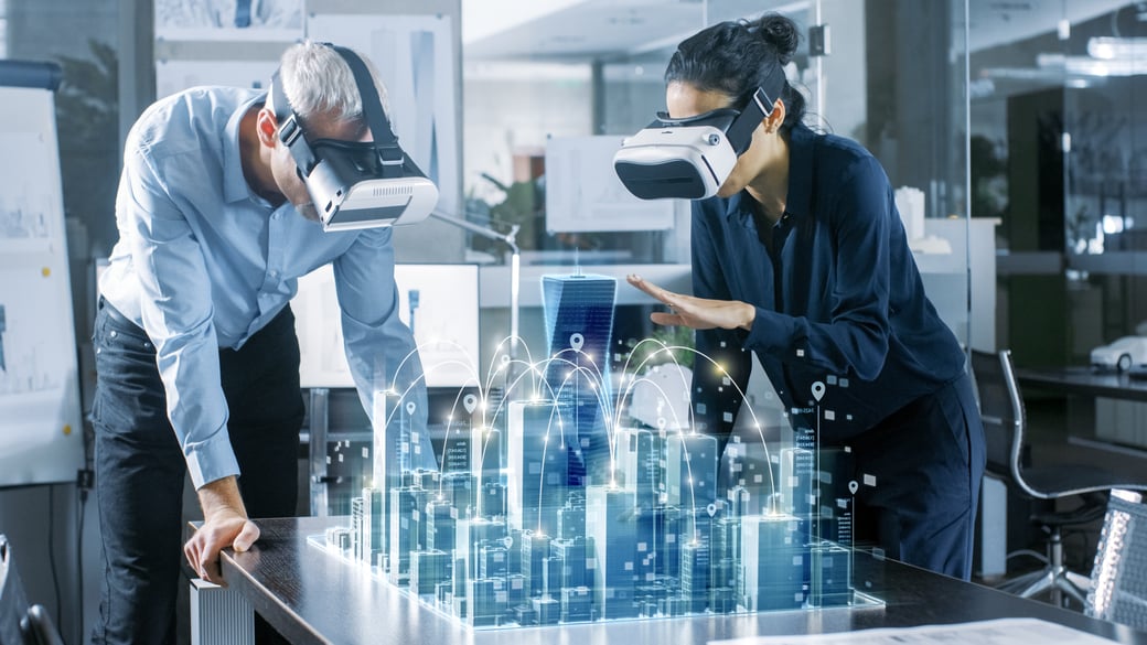 People looking over VR cityscape